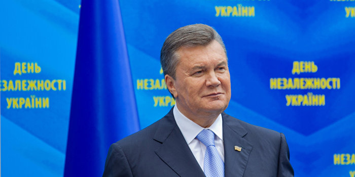 Киев начал заочный суд над Януковичем