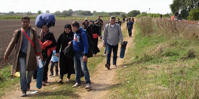 L'Express: Мигранты - причина разрушения Шенгенской зоны