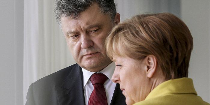 Меркель и Порошенко обсудили проведение встречи «нормандской четверки» Меркель и Порошенко обсудили проведение встречи «нормандской четверки»