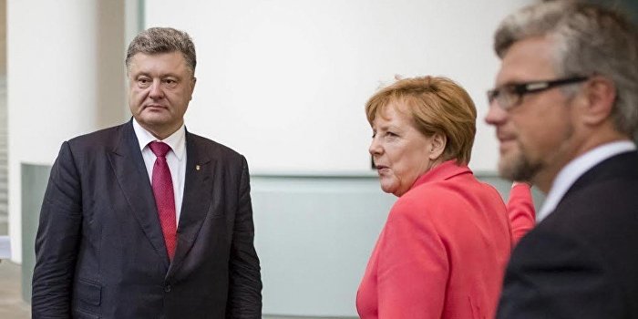 Порошенко обсудит с Меркель Донбасс в Берлине