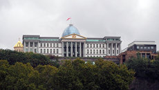 В Грузии приняли ставшие причиной беспорядков поправки к Конституции