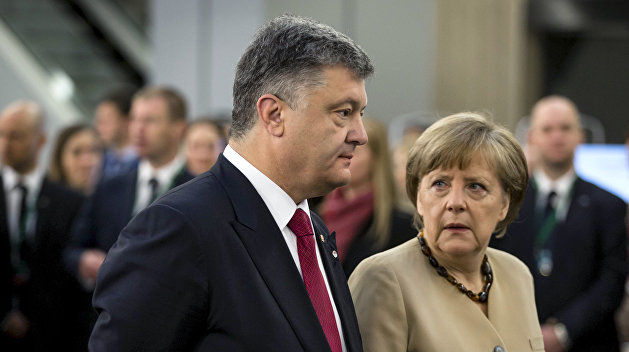 Меркель рассказала Порошенко о переговорах с Путиным Меркель рассказала Порошенко о переговорах с Путиным