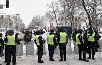 Amnesty International потрясена тем, что на МихоМайдане полицейский ударил журналиста по ноге