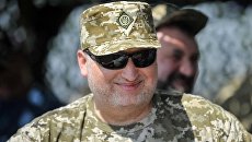 Политолог объяснил, чем Турчинову грозит «сдача Крыма»