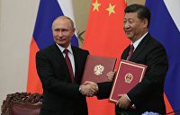 Писатель определил место России между Западом и Китаем