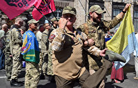 Из ветеранов — в киллеры. Эксперты о том, чем бойцы АТО опасны Украине