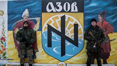 «На руку врагу». «Азов» осудил своего ветерана за участие в ролике с ополченцем ДНР