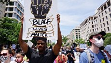 Политолог рассказал, что заставило чёрное и белое население США выйти на протесты