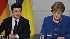 Эксперт объяснил, как Зеленский использует «Нацкорпус» на переговорах с Меркель