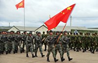 Акопов: Россия и Китай должны милитаризовать ШОС