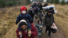 «По сухопутному маршруту через Россию». Кого еще коснется миграционный кризис в Европе