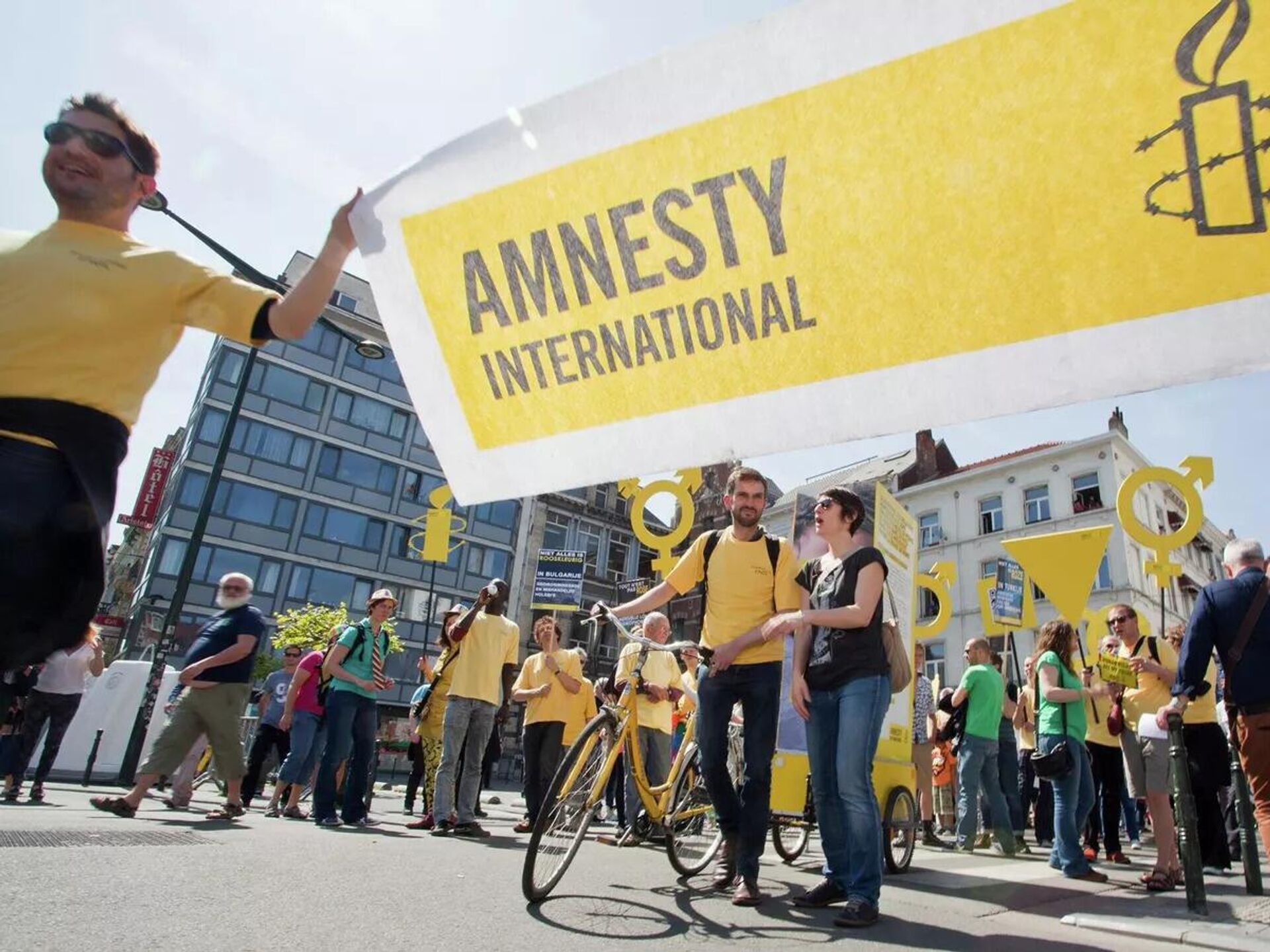 Амнистия компании. Amnesty International (Амнести Интернешнл). Международная амнистия. Международная амнистия организация. Amnesty International в России.