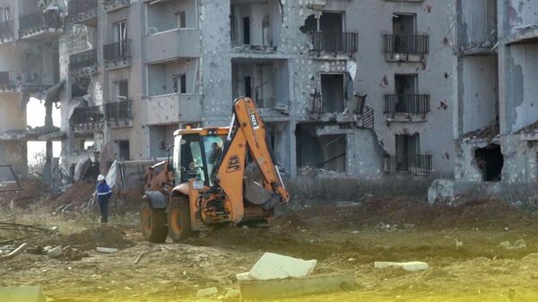 Как Россия поднимает из руин уничтоженный Мариуполь. Видео