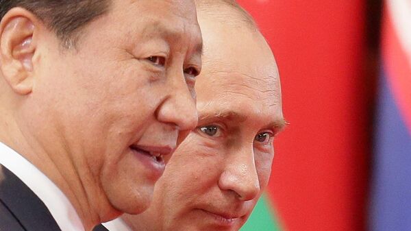Мир под сенью дракона и орла. России и Китаю выгодно действовать синхронно