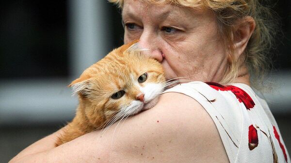 Фото: Жительница Курской области со спасенным питомцем

