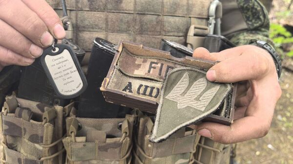 Трофейный нацистский жетон