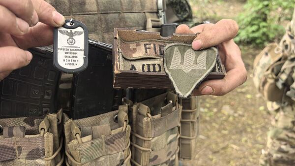 Трофейный нацистский жетон