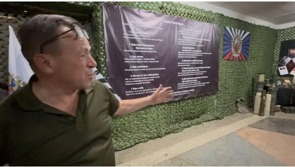 Шаман рядом с Кодексом Чести воина