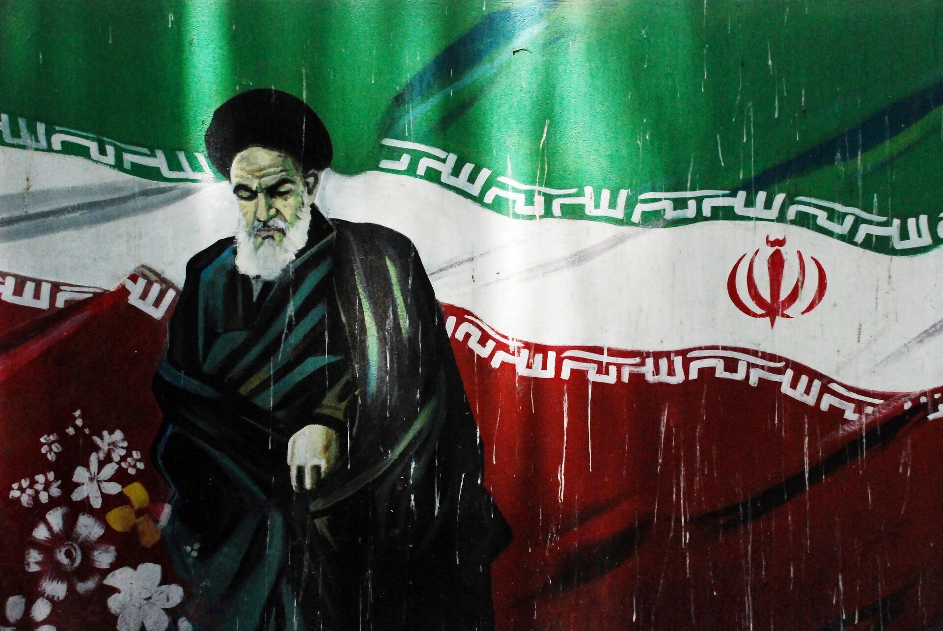 Граффити с изображением основателя Исламской Республики Иран аятоллы Рухоллы Хомейни на одной из улиц в Тегеране. - РИА Новости, 1920, 05.03.2026