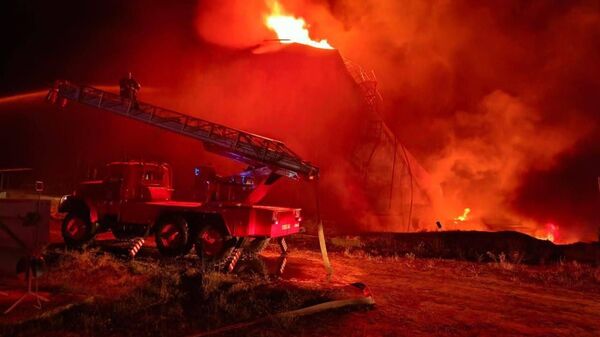 Кадры с горящей нефтебазы Triton