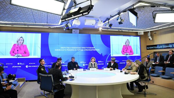 Презентация доклада о военных преступлениях киевского режима в Красноармейске