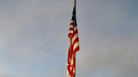 поднятие флага США в Каракасе