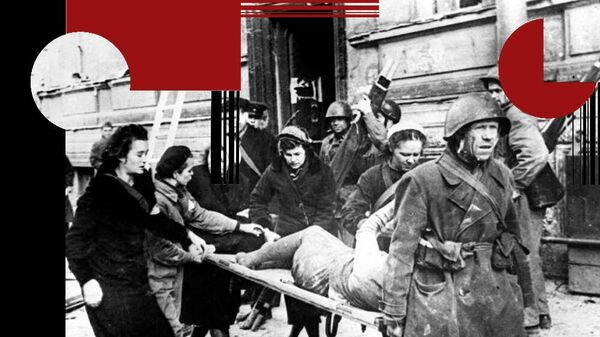 Бойцы МПВО эвакуируют пострадавших после немецкого авианалета на Ленинград, 1943 год