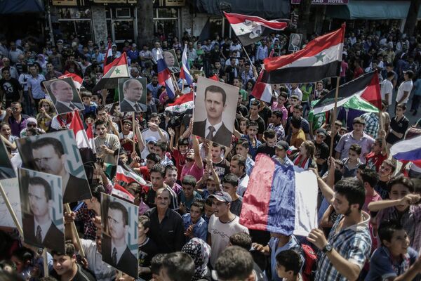 Митинг в поддержку Б. Асада и В. Путина в Сирии