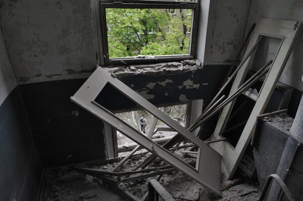 Последствия обстрелов в Донецке Последствия обстрелов в Донецке