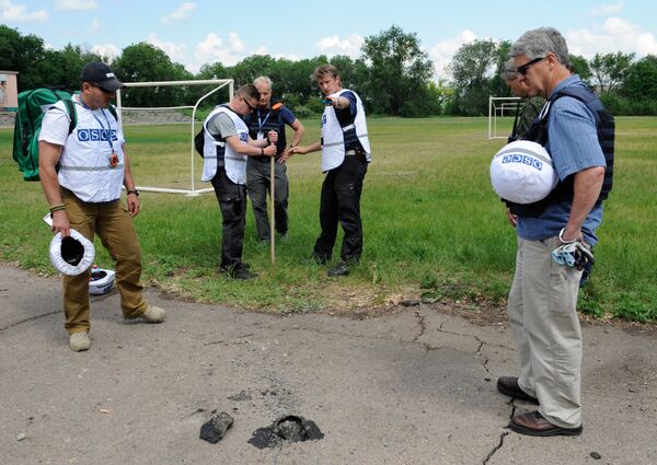 Представители ОБСЕ прибыли на место обстрела в Донецке