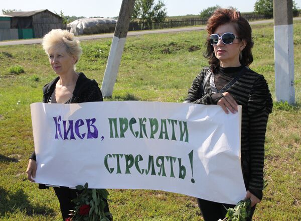 Митинг-реквием Судьбы оборванная нить, посвященный годовщине падения Боинга в Донецкой области Митинг-реквием Судьбы оборванная нить, посвященный годовщине падения Боинга в Донецкой области