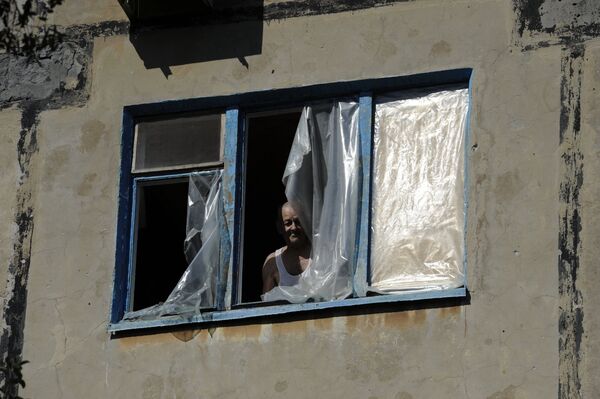 Последствия обстрела поселка Октябрьский в Донецкой области Последствия обстрела поселка Октябрьский в Донецкой области