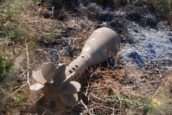 Один из разорвавшихся снарядов, которыми украинские силовики обстреляли позиции батальона ополчения ДНР Викинги