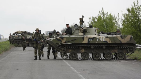 Украинские военные начали штурм города Славянска Украинские военные начали штурм города Славянска