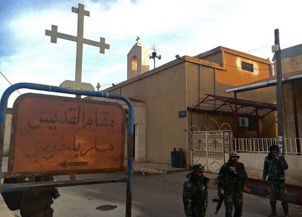 Сирийские ополченцы в христианской деревне Садад, провинция Хомс, Сирия