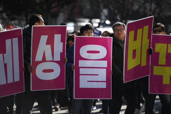Акция протеста в Сеуле с требованием отставки президента Пак Кын Хе
