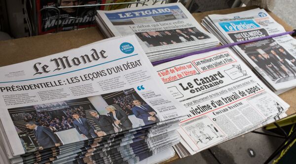 Первые полосы газет, посвященных президентским дебатам во Франции