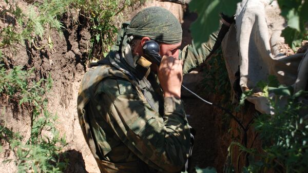 Бойцы 1-й Славянской бригады ополчения ДНР на позиции у линии соприкосновения с В