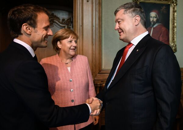Встреча канцлера ФРГ А. Меркель, президента Франции Э. Макрона и президента Украины П. Порошенко