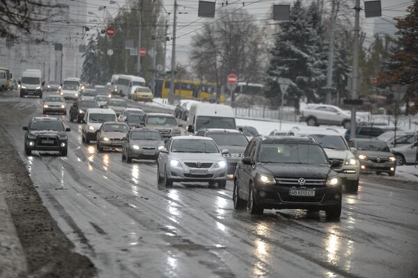 Киев снег улица вид  автомобиль