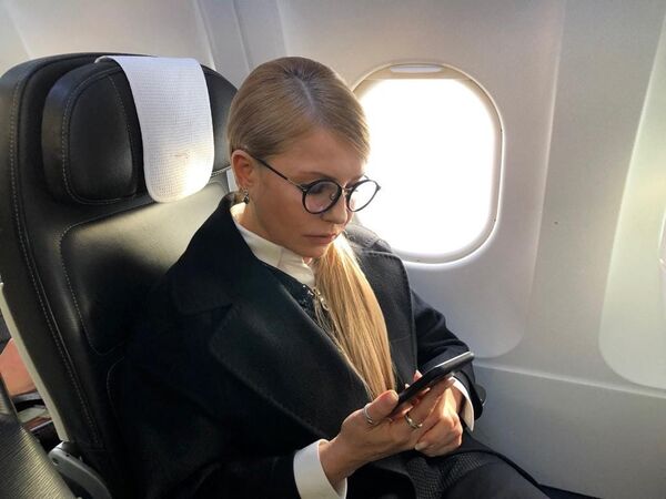 Юлия Тимошенко самолет мобильник