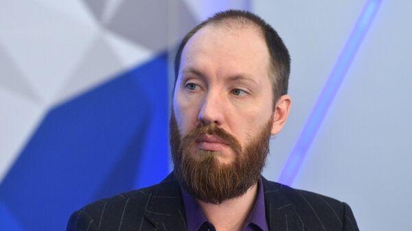 Александр Васильев