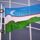 Государственный флаг Узбекистана у здания генконсульства Республики Узбекистан в Екатеринбурге.