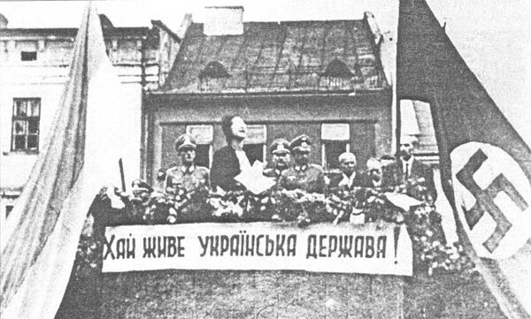 бандеровская часть ОУН* провозгласила создание «Украинской Державы», призванной «тесно сотрудничать с Национал-Социалистической Великой Германией» бандеровская часть ОУН* провозгласила создание «Украинской Державы», призванной «тесно сотрудничать с Национал-Социалистической Великой Германией»