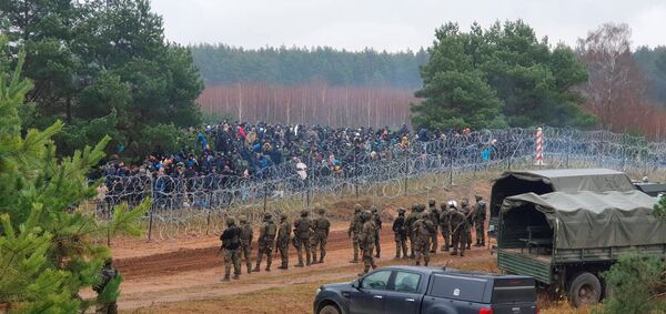 граница беженцы нелегальные мигранты польша белоруссия