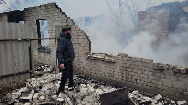 Обстрел Донецка ВСУ автомобиль разрушенный дом житель