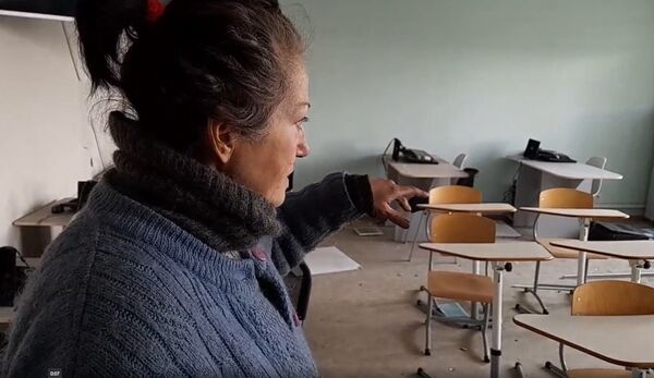 Мариуполь школа разрушения учитель жители