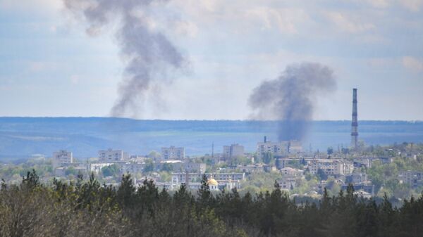 Обстрел украинскими войсками города Изюм Харьковской области